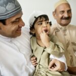 Muslim family having dried dates as a snack